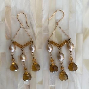 Stone and pearl drop earrings.